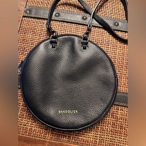 bandolier, round pouch, and strap.